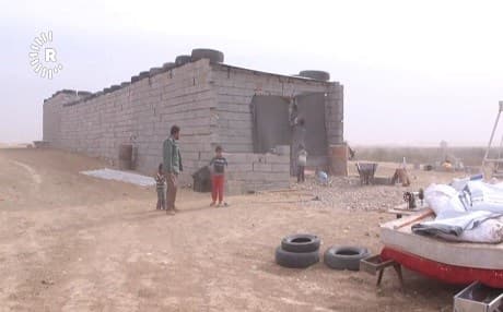 File photo shows a Kurdish family taking refuge in a desert area displaced from Tuz Khurmatu following the Iraqi takeover of the diverse town on October 16. File Photo: Rudaw TV