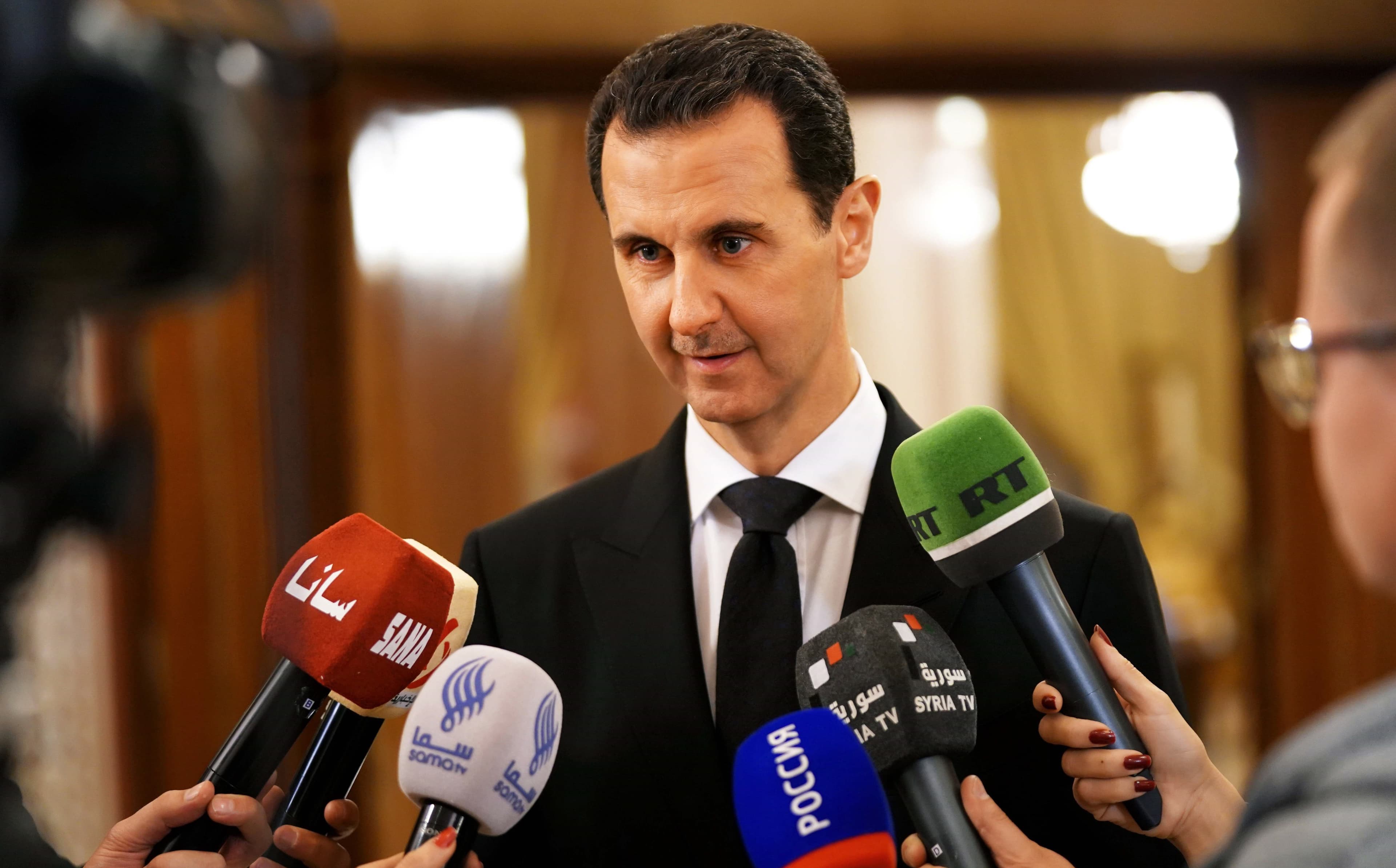 Syrian President Bashar al-Assad speaking to press in Damascus on Monday. Photo: AFP/HO/SANA