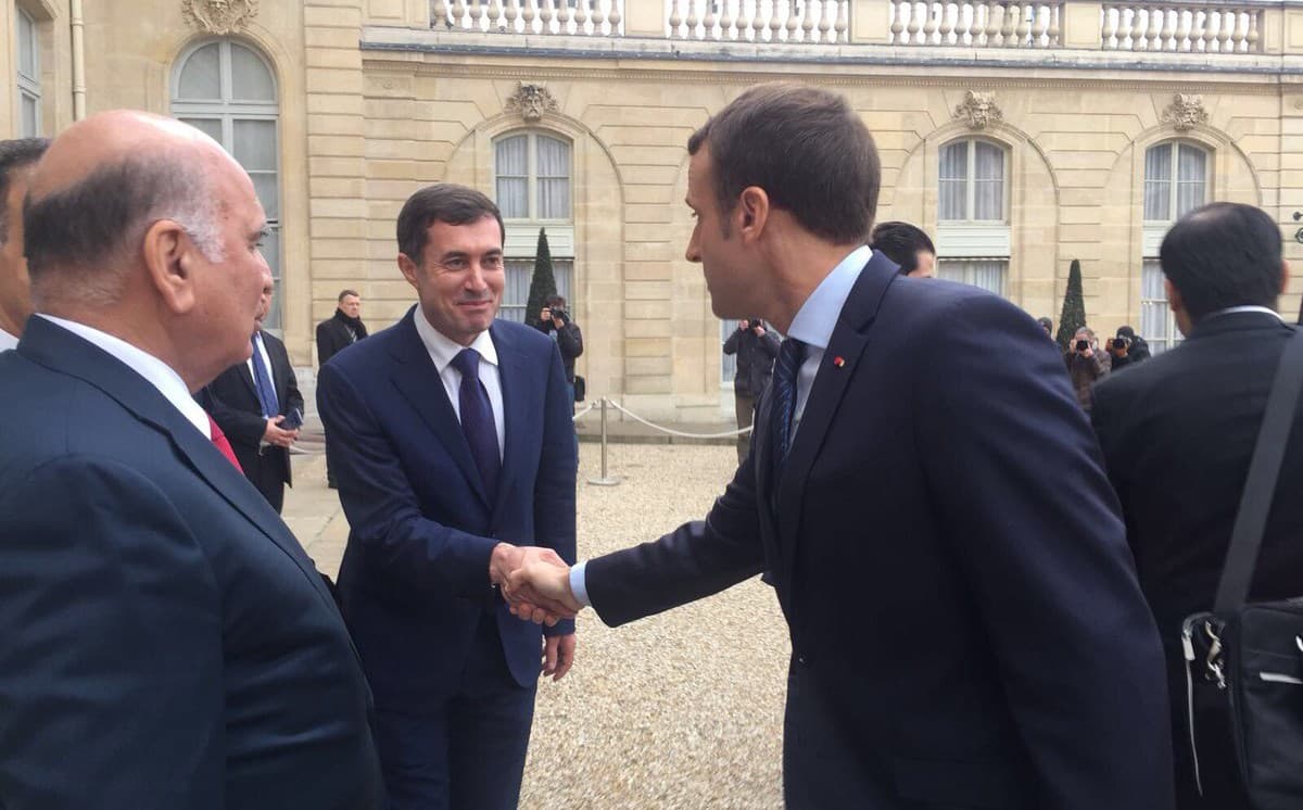 Ali Dolamari (L) shaking hands with French President Emmanuel Macron (R) during the KRG’s visit to Elysee Palace on December 2. Photo: Ali Dolamari twitter