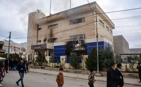 A picture shows the burnt premises ofa Kurdish partyin Raniya, 130 kilometres north of Sulaimani, on December 20, 2017 when anti-government protests went violent on December 20, 2017. Photo: AFP/Shwan Mohammed