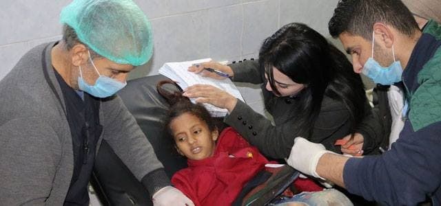 An injured girl receives treatment at the Avrin hospital in the Kurdish-majority town of Afrin in northern Syria, on January 23, 2018, as Turkish troops and their Syrian rebel allies pressed an assault on the border enclave. Photo: AFP / Ahmad Shafia Bilal