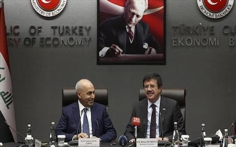 Iraqi by Planning Minister Salman Ali al-Jumaili sits down at a news conference with Turkish Economy Minister Nihat Zeybekci in Ankara. Photo: AA