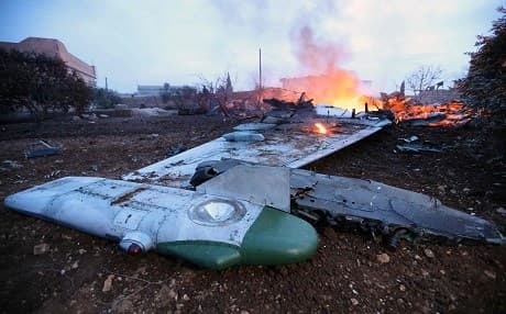 A picture taken on February 3, 2018, shows smoke billowing from the site of a downed Sukhoi-25 fighter jet in the the Syrian city of Saraqib, southwest of Aleppo. Rebel fighters shot down a Russian plane over Syria's northwest Idlib province and captured its pilot, the Syrian Observatory for Human Rights said. / AFP / Omar Haj Kadour