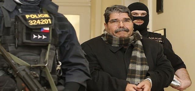 Czech police escort PYD founder Salih Muslim to court in Prague on February 27, 2018. Photo: Petr Hornik | Novinky