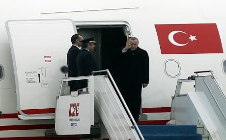Recep Tayyip Erdogan boards a plane on before a state visit to Bulgaria on at Istanbul's Attaturk airport March 26, 2018. Photo: AA