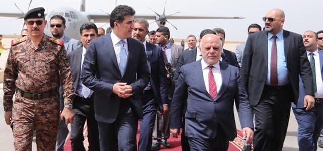 Iraqi Prime Minister Haider al-Abadi is greeted at Erbil airport by Kurdistan Region Prime Minister Nechirvan Barzani, April 26. Photo: Rudaw