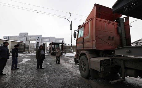 Trucks pass through the Kurdistan Region-Iran border. Photo: Safin Hamed/AFP