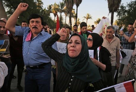 Iraqis in Baghdad protest against poor services and high unemployment on Friday. Photo: Ahmad al-Rubaye/AFP