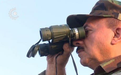 A Peshmerga soldier keeps his eyes on the battlefield during a Kurdish-Iraqi-Coalition forces anti-ISIS operation on Mount Qarachogh on the Makhmour Front that began on July 16, 2017. Photo: Rudaw