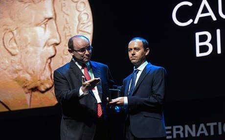 Kurdish mathematician, Cauchar Birkar (right) receives the Fields Medal Award, math's most prestigious prize, during the International Congress of Mathematicians in Rio de Janeiro, Brazil, on August 1, 2018. Photo: Fabio Teixeira | AFP