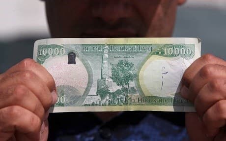 The KRG Council of Ministers will allow ministries to keep 20 percent of their income to reinvest in stalled projects. File photo: Ahmad al-Rubaye / AFP