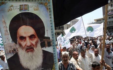 Followers of Ayatollah Ali al-Sistani, Iraq's highest Shiite authority, hold a poster ahead of parliamentary elections. File photo: AFP