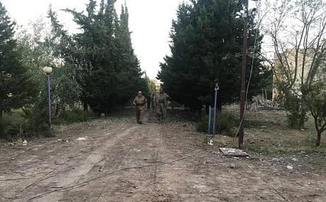 Peshmerga from Rojhelat (Iranian Kurdistan) inspect damage after Iran launched seven missiles at a joint base in Koya, Kurdistan Region. File photo: Rudaw