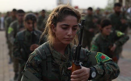 Members of the YPJ attend the funeral of four SDF fighters in Qamishli on September 14, 2018. The four were killed battling ISIS in Deir ez-Zor. Photo: Delil Souleiman/AFP