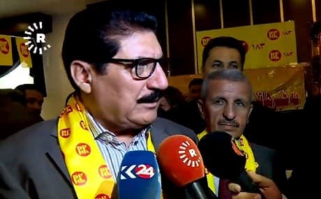 KDP politburo chief Fazil Mirani speaks to journalists while campaigning in Pirmam, September 22, 2018. Photo: Rudaw video