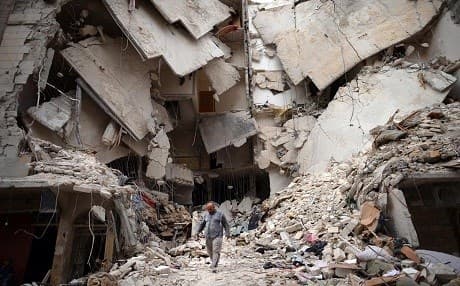 A Syrian man walks through the rubble in the northern Syrian city of Aleppo. Photo: AFP