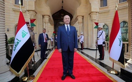 Newly elected Iraqi President Barham Salih greets the crowd during the handing over ceremony in Baghdad on October 3, 2018. Photo: Sabah Arar/AFP