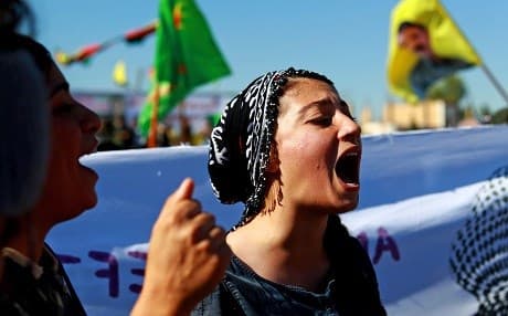 A Kurdish protester chants slogans during a demonstration in the town of al-Qahtaniyah, in Hasaka province on November 1, 2018, against Turkish attacks on Kurdish militia posts in northern Syria. Photo: Delil Souleiman/AFP