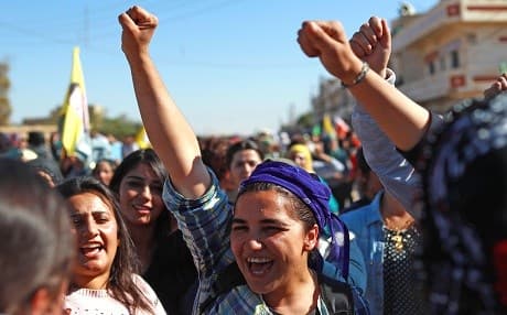 Protesters, mainly Kurds, chant slogans during a demonstration in the town of al-Qahtaniyah, in the Hasaka governorate near the Syrian-Turkish border on November 1, 2018, against Turkish attacks on Kurdish posts in northern Syria. Photo: Delil Souleiman | AFP