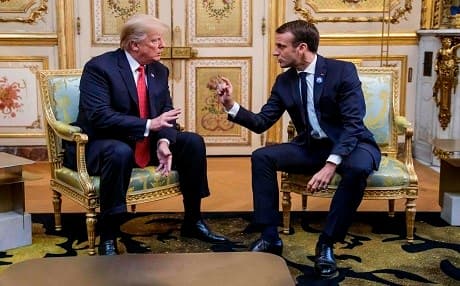 US President Donald Trump (left) speaks with French president Emmanuel Macron prior to their meeting at the Elysee Palace in Paris, on November 10, 2018, on the sidelines of commemorations marking the 100th anniversary of the 11 November 1918 armistice, ending World War I. Photo: Christophe Petit-Tesson | AFP