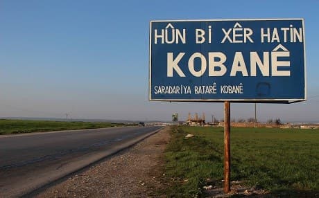 A billboard on the outskirts of Kobane reads: 'Welcome to Kobane, the municipality of Kobane' on February 25, 2019. Photo: Hannah Lynch | Rudaw