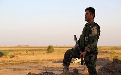 A member of the Pershmerga, stands guard near Tuz Khurmatu, 70 kilometres south of Kirkuk on June 24, 2014. File photo: Marwan Ibrahim AFP