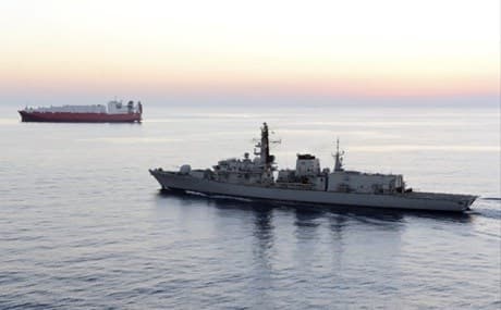 In this image from file video provided by UK Ministry of Defence, British navy vessel HMS Montrose escorts another ship during a mission to remove chemical weapons from Syria at sea off coast of Cyprus in February 2014. Photo: UK Ministry of Defence / AP