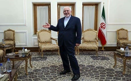 Iranian Foreign Minister Mohammad Javad Zarif gestures as he stands in an office as he meets with the diplomatic advisor to the French president in the capital Tehran on July 10, 2019. Photo: Atta Kenara | AFP