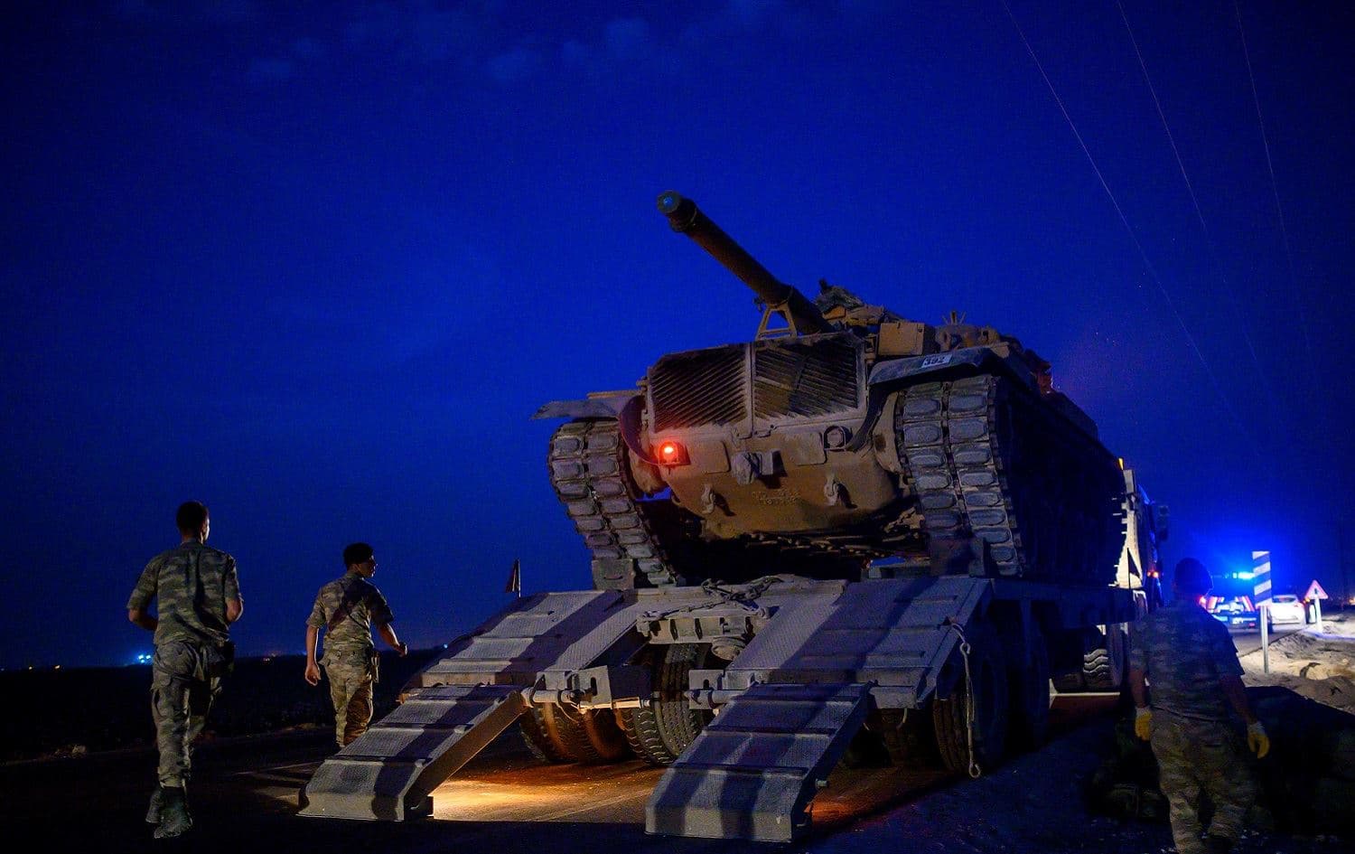 A Turkish tank is deployed in Sanliurfa province near the Syrian border, October 8, 2019. Photo: Bulent Kilic / AFP
