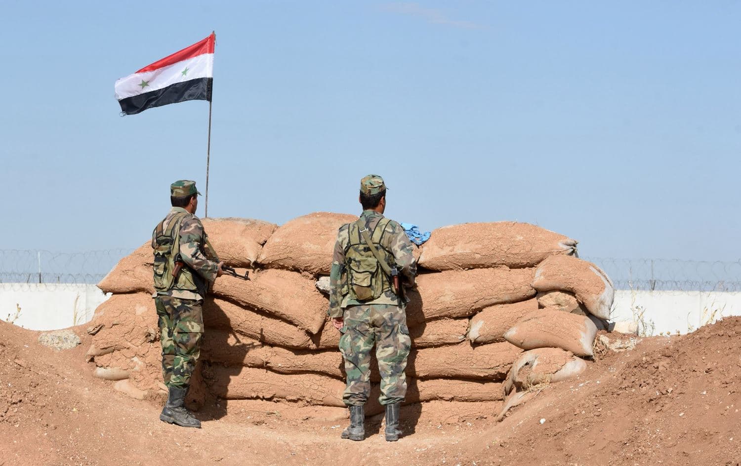 Syrian regime forces man a position in the countryside of the city of Kobane on the border with Turkey on November 3, 2019. Photo: AFP