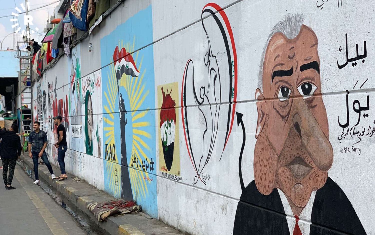 Murals cover the walls of the underpass of Tahrir Square, Baghdad on December 4, 2019. Photo: Lawk Ghafuri / Rudaw