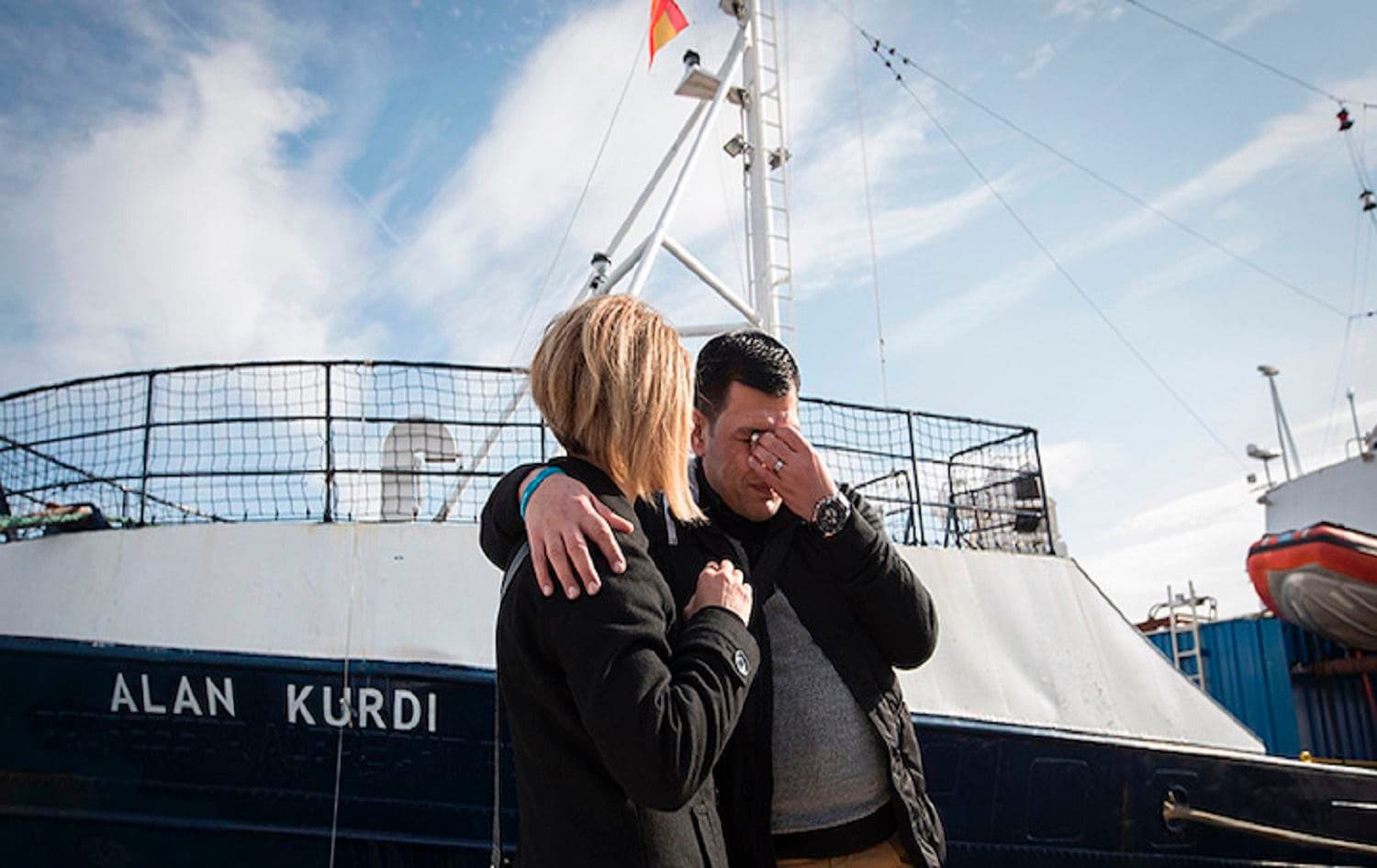 Abdullah Kurdi is consoled as he attends a special ceremony for the renaming of a migrant rescue ship, Feb. 10, 2019. Photo: Jamie Reina/AFP