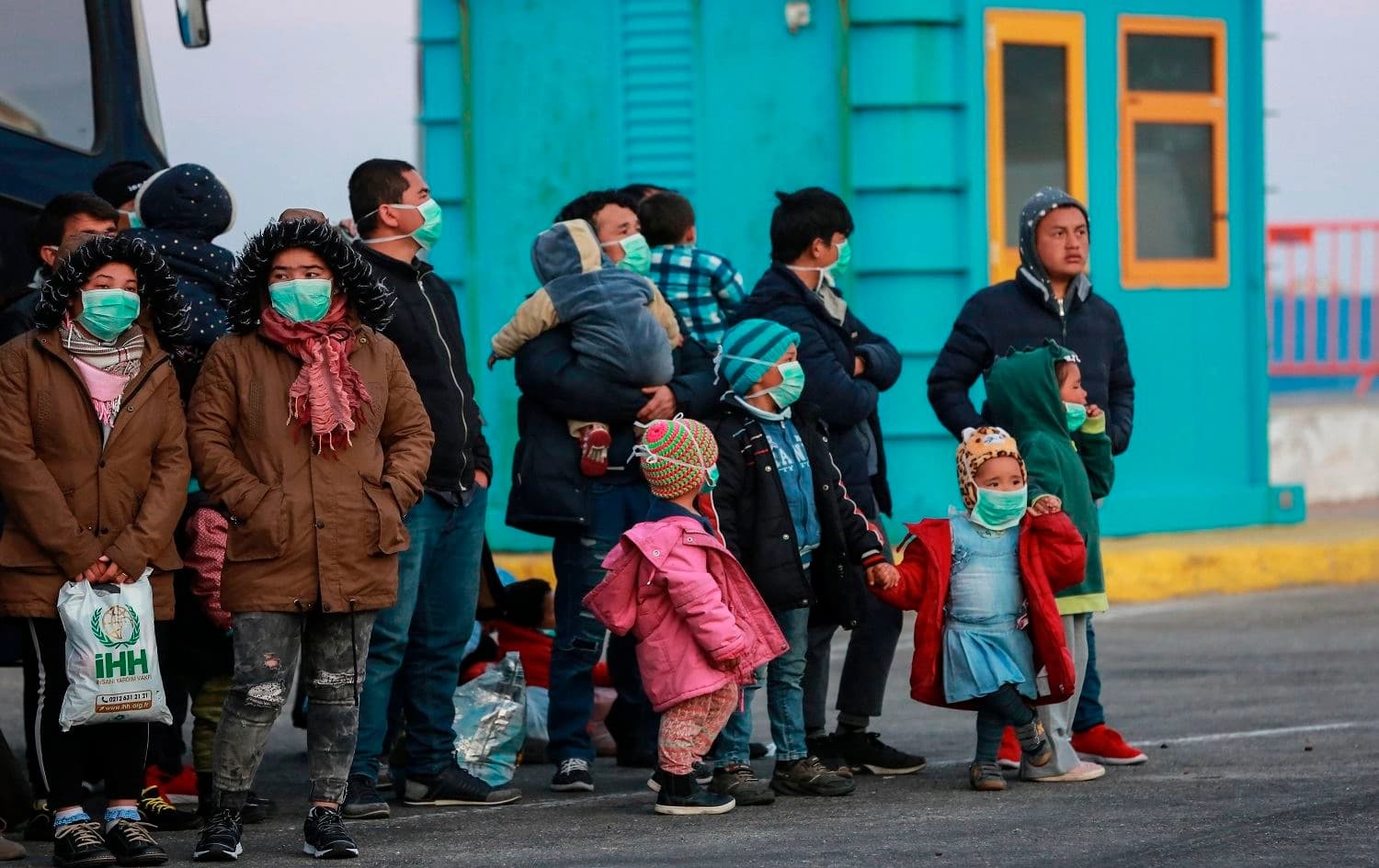 Migrants arrive at the port of Mytilene in the Greek island of Lesbos on March 20, 2020. Photo: Manolis Lagoutaris/AFP