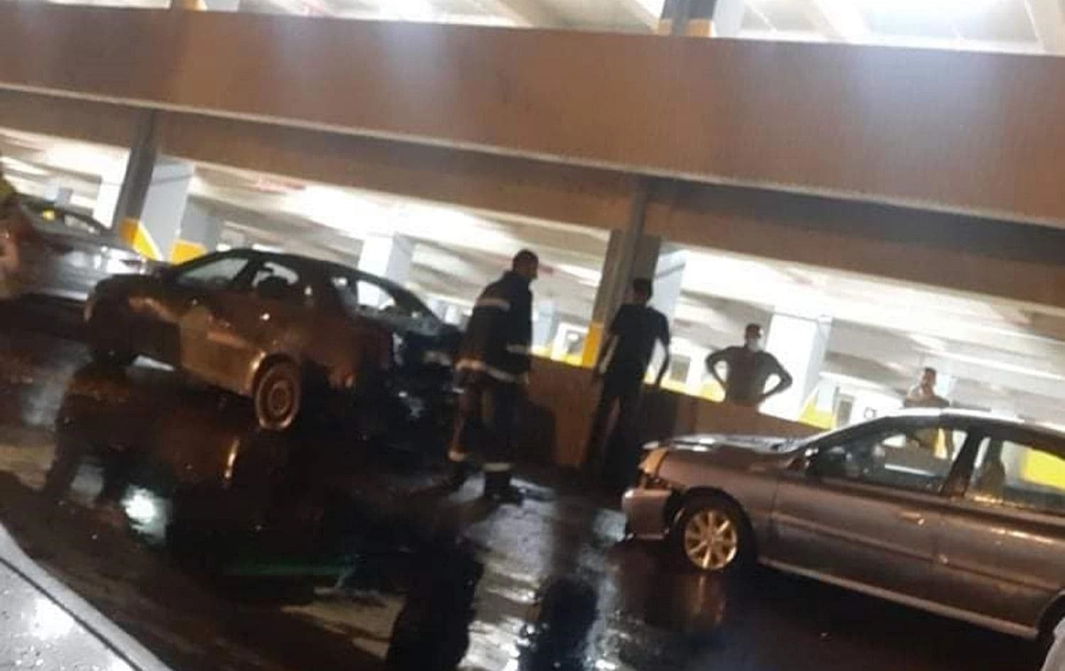 Vehicles damaged after a Katyusha rocket hit a parking garage at Baghdad International Airport on September 6, 2020. Photo: Baghdad International Airport on Facebook