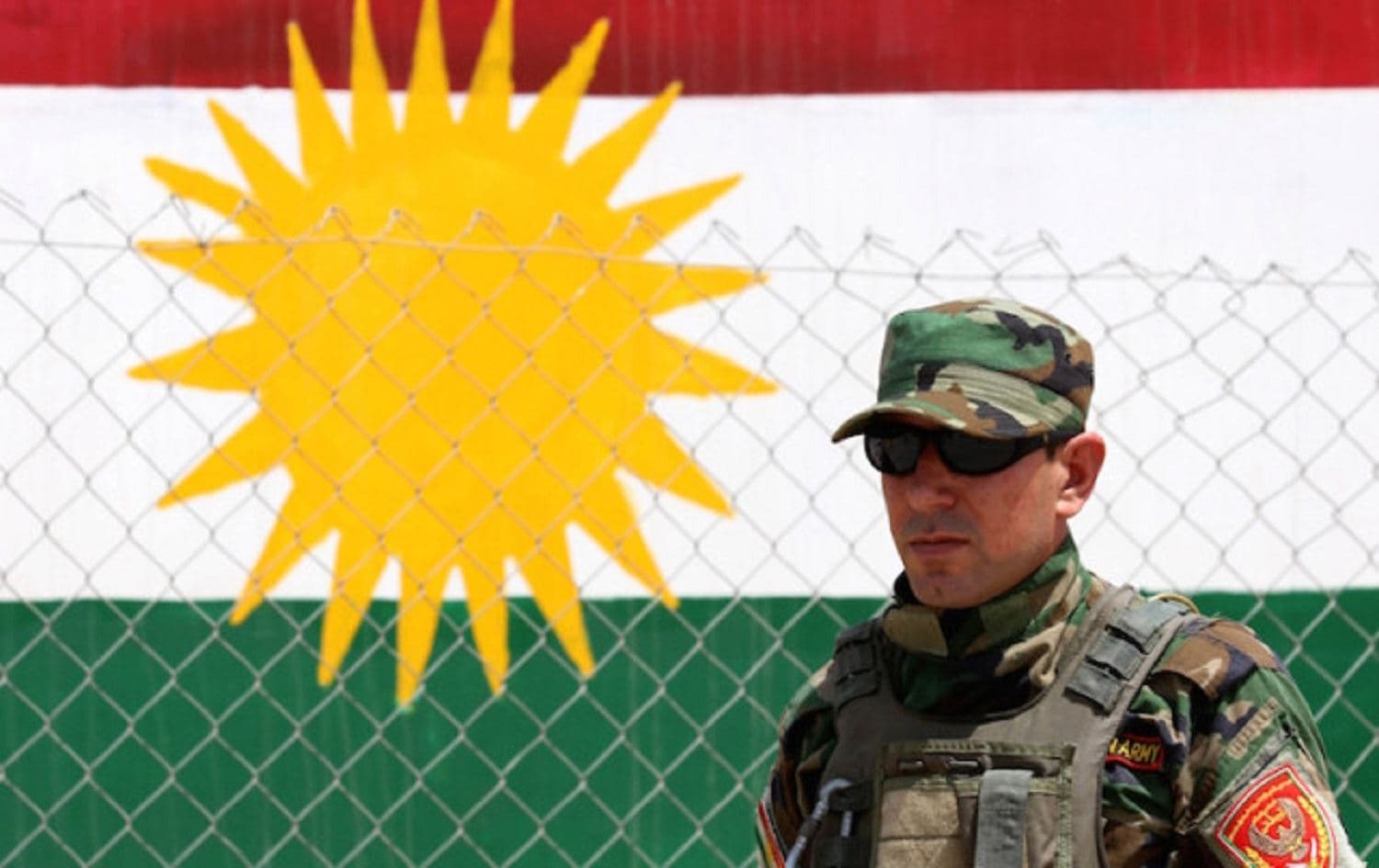 A Peshmerga fighter monitors his surroundings at the top of Mount Zardak, about 25 kilometres east of Mosul, on August 6, 2015. File photo: Safin Hamed / AFP