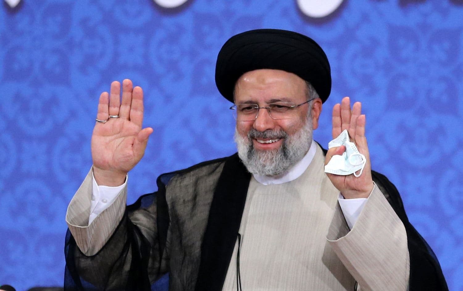 Iran's President-elect Ebrahim Raisi smiles as he greets media representatives during his first press conference in the Islamic republic's capital Tehran, on June 21, 2021. Photo: Atta Kenare/AFP