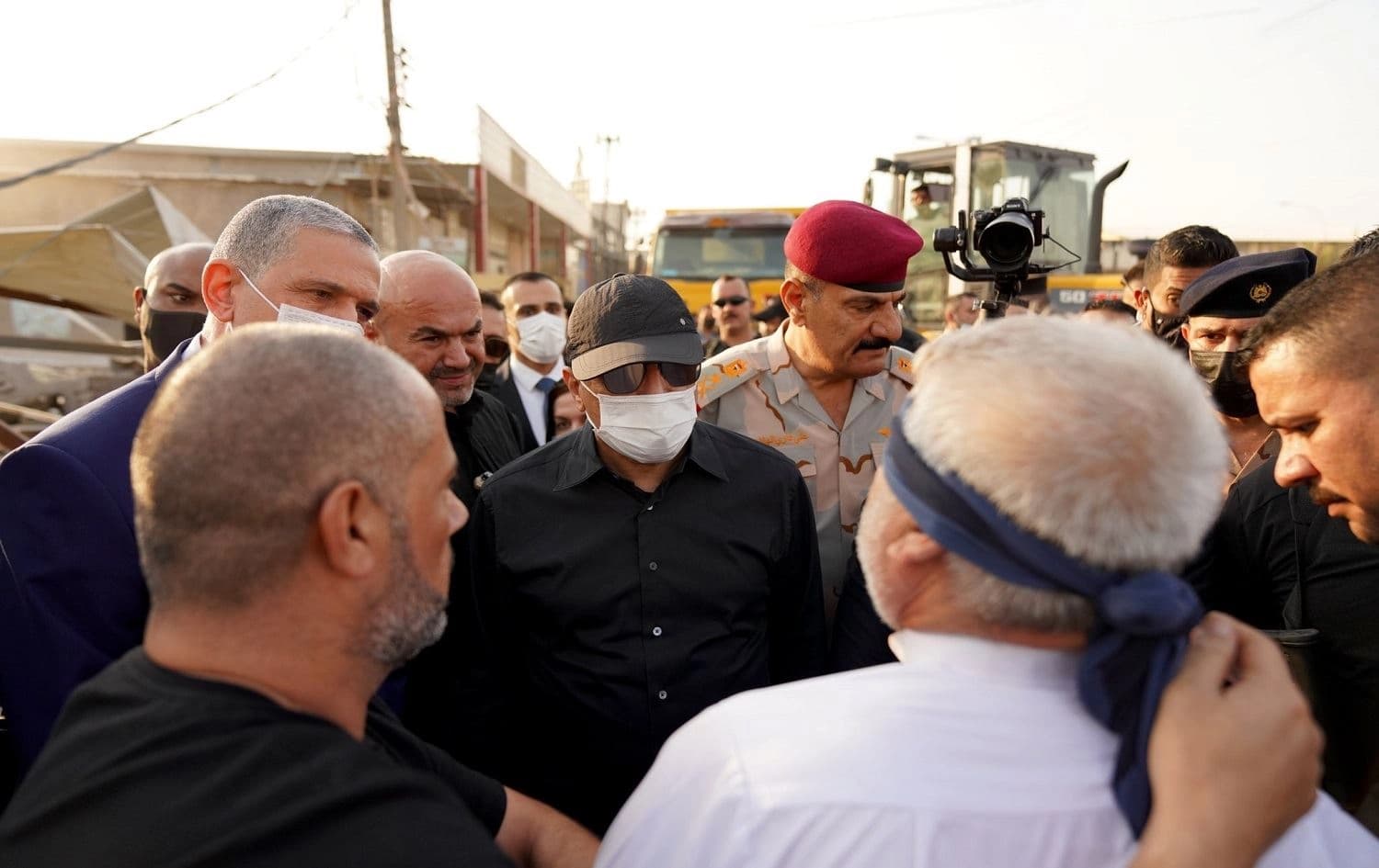 Prime Minister Mustafa al-Kadhimi meets with the suspected killer in Karbala on August 11, 2021. Photo via Kadhimi's office/Twitter