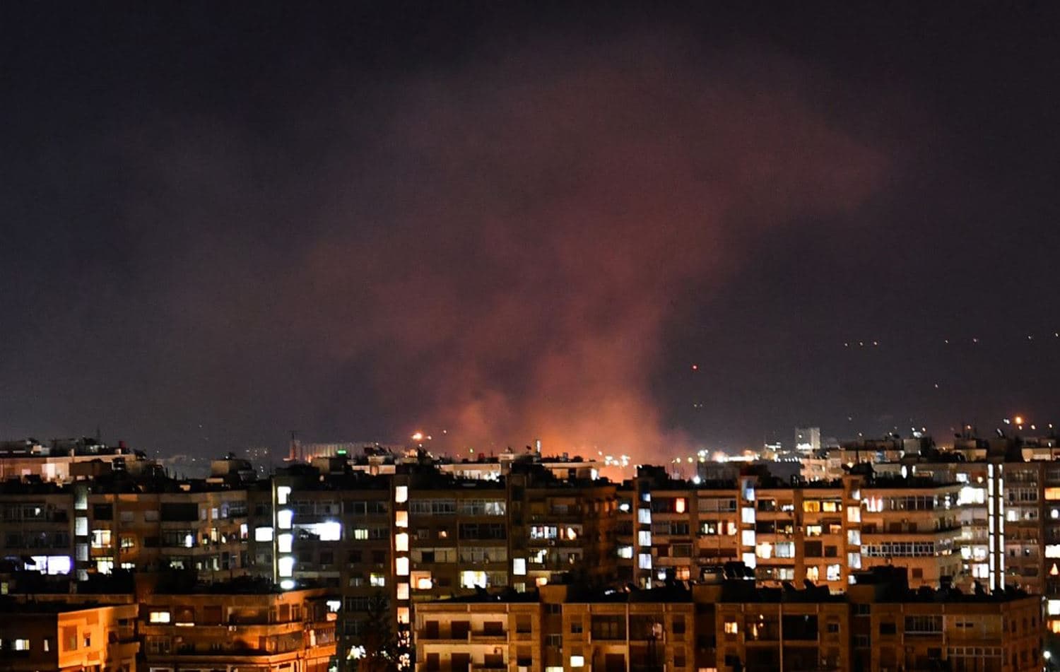 A cloud of smoke rises after an Israeli airstrike which targeted south of the capital Damascus on July 20, 2020. (AFP)