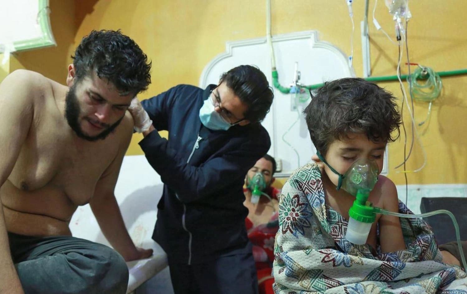 A Syrian child receives treatment for a suspected chemical attack in a makeshift clinic in Eastern Ghouta on the outskirts of Damascus. Photo: Hamza Al Ajweh / AFP