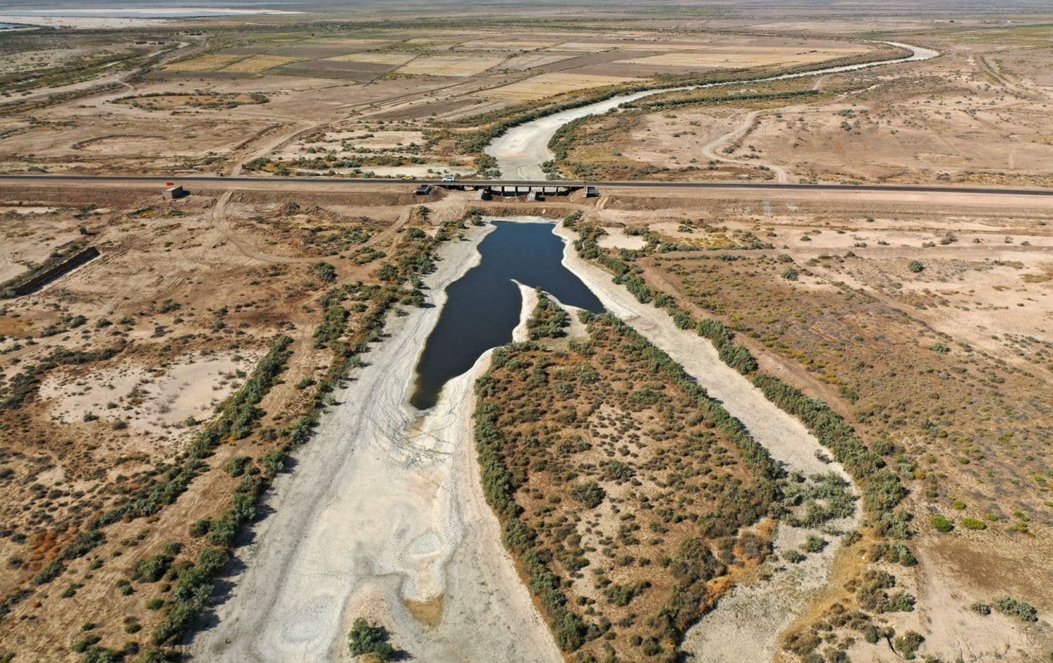 A dried-up river bed in the al-Huwaiza Marshes, south of Baghdad, taken in September 2021. Photo: Asaad Niazi /AFP