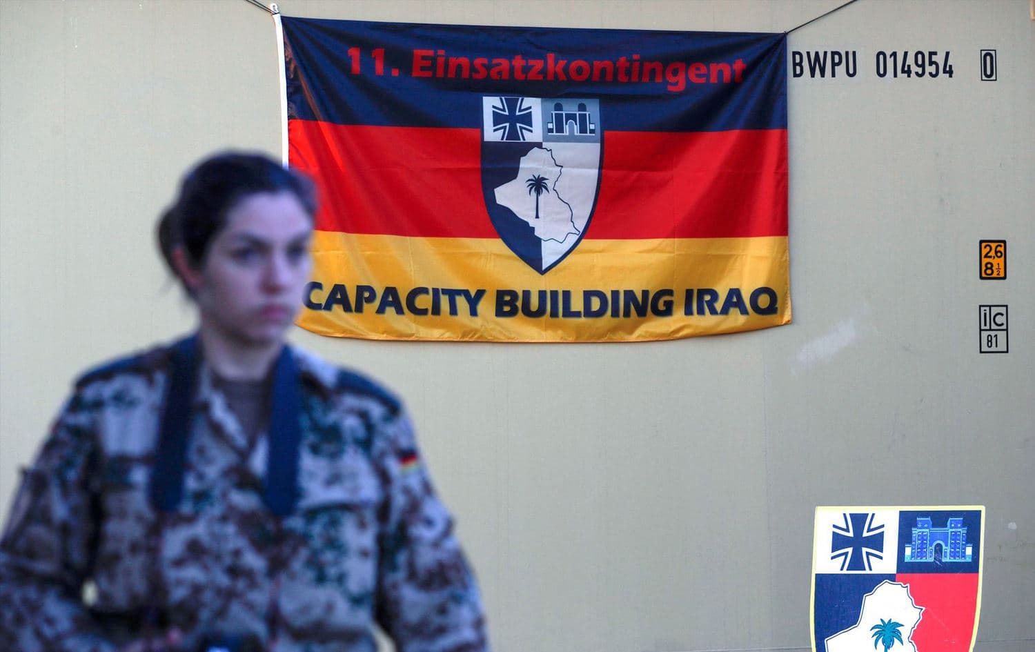 A German soldier awaits the arrival of German Defence Minister Christine Lambrecht's to Erbil. Date: January 9, 2022. Photo: AFP