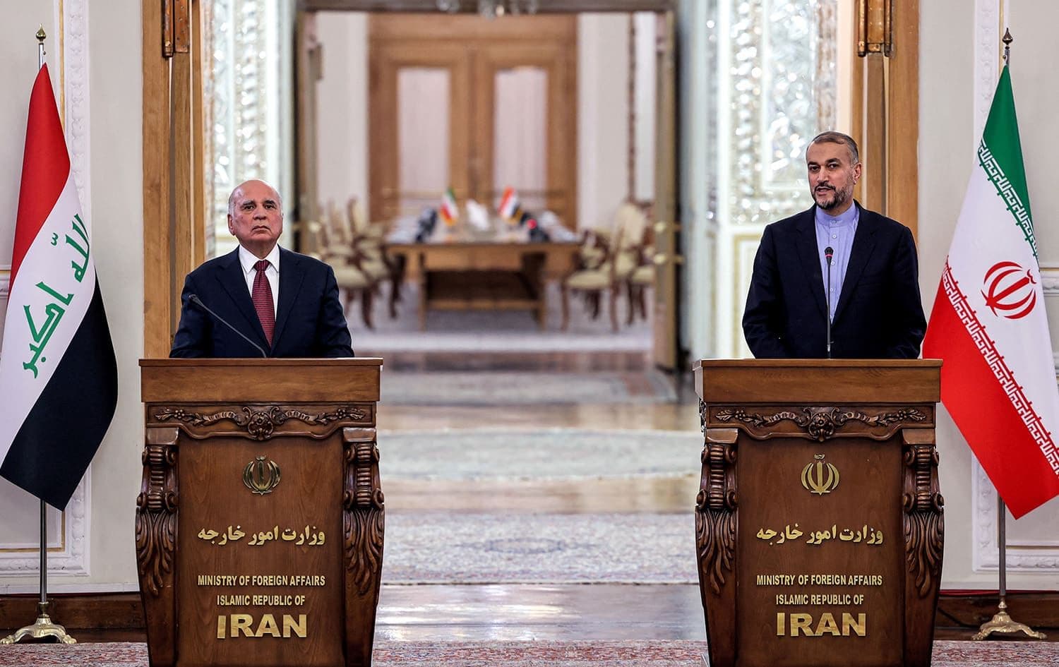 Iraqi Foreign Minister Fuad Hussein (left) held a press conference with his Iranian counterpart Hossein Amir-Abdollahian after their meeting in Tehran on April 14, 2022. Photo: Atta Kenare/AFP