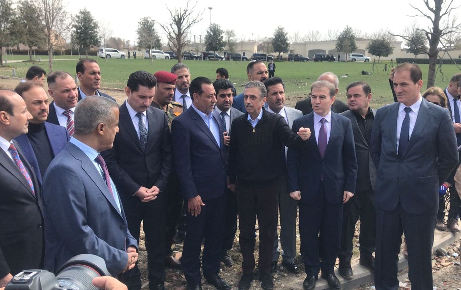 The investigation and fact-finding parliamentary committee into Erbil's missile attack visiting the site of the incident, and being received by Baz Karim Barzinji, on March 15, 2022. Photo: Iraqi state media (INA)