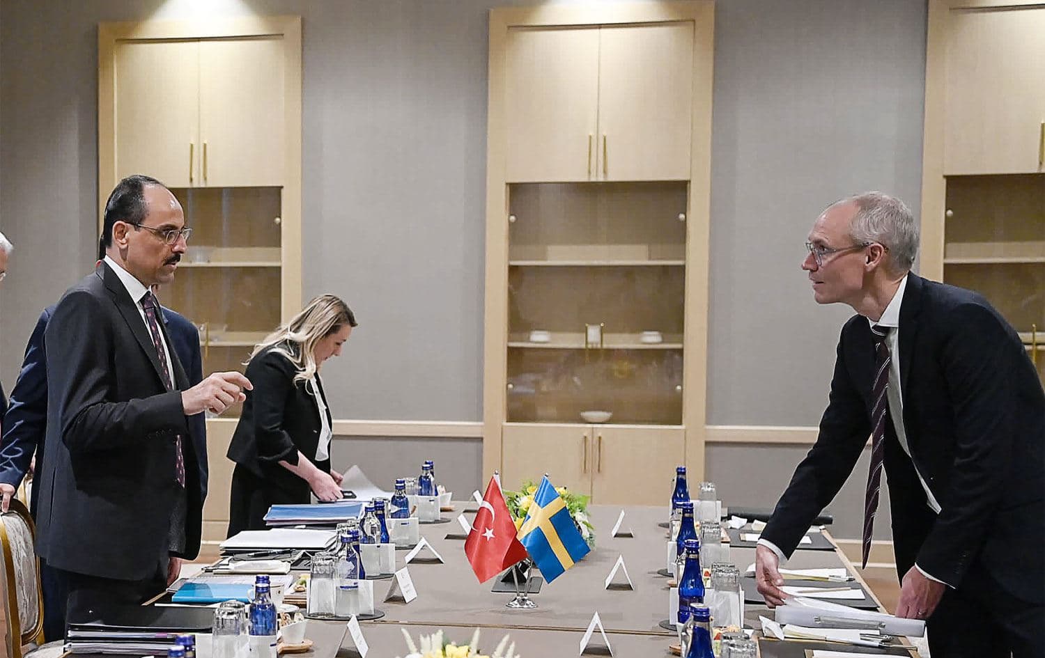 This handout photo taken and released by the Turkish presidential press service on May 25, 2022, shows Turkish Presidential spokesperson Ibrahim Kalin (L) and Swedish State Secretary with responsibility for foreign affairs and the Security Policy Council Oscar Stenstrom (R) speaking before a meeting over Sweden's bid to join NATO in Ankara.