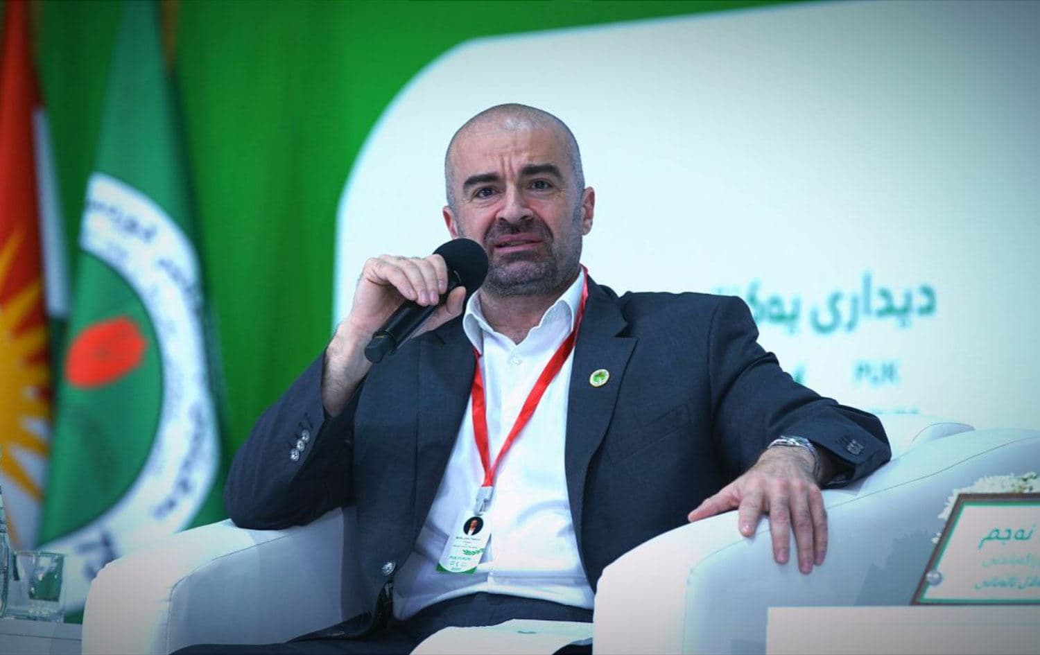 PUK leader Bafel Talabani speaks at a party forum in Sulaimani on May 28, 2022. Photo: PUK Media