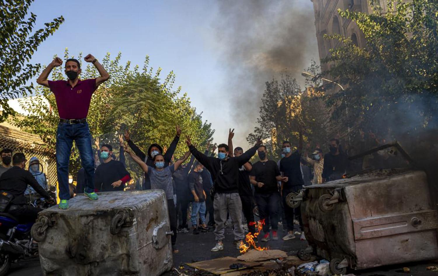 In this photo taken by an individual not employed by the Associated Press and obtained by the AP outside Iran, Iranians protests the death of 22-year-old Mahsa Amini after she was detained by the morality police last month, in Tehran, Thursday, Oct. 27, 2022. Photo: AP
