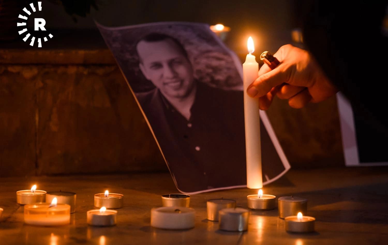Friends and admirers of Husham al-Hashimi on Saturday pay their respects for the slain Iraqi security analyst in Erbil’s Sami Abdulrahman Park on July 11, 2022. Photo: Bilind T. Abdullah