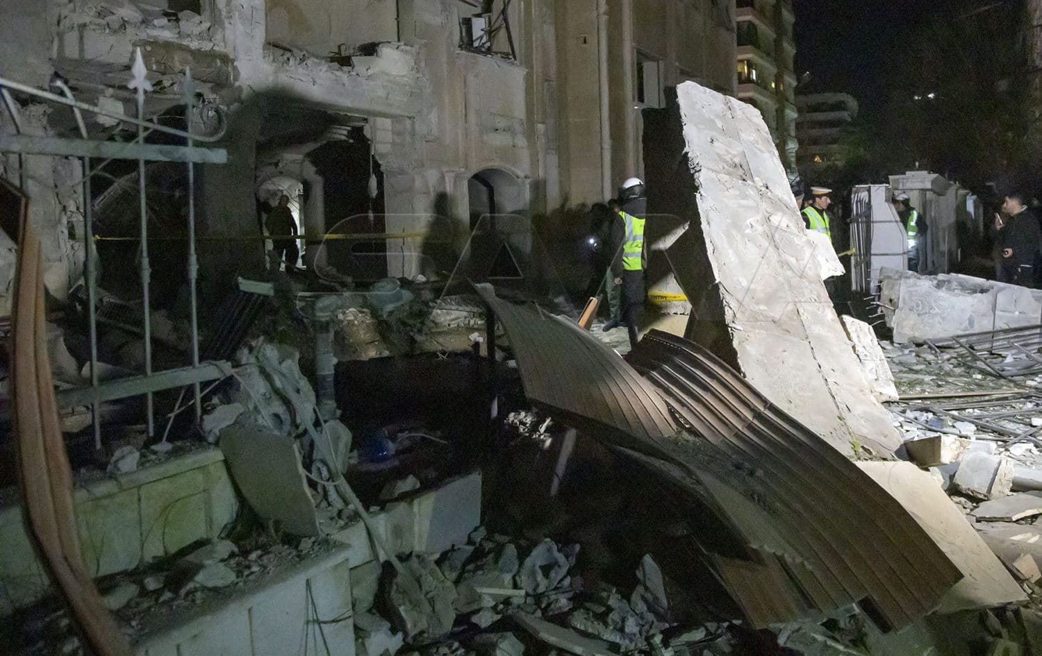 The aftermath of a barrage of suspected Israeli missiles hit several locations in Syria in the early hours of February 19, 2022, with footage showing the impact on a residential building in Damascus. Photo: SANA