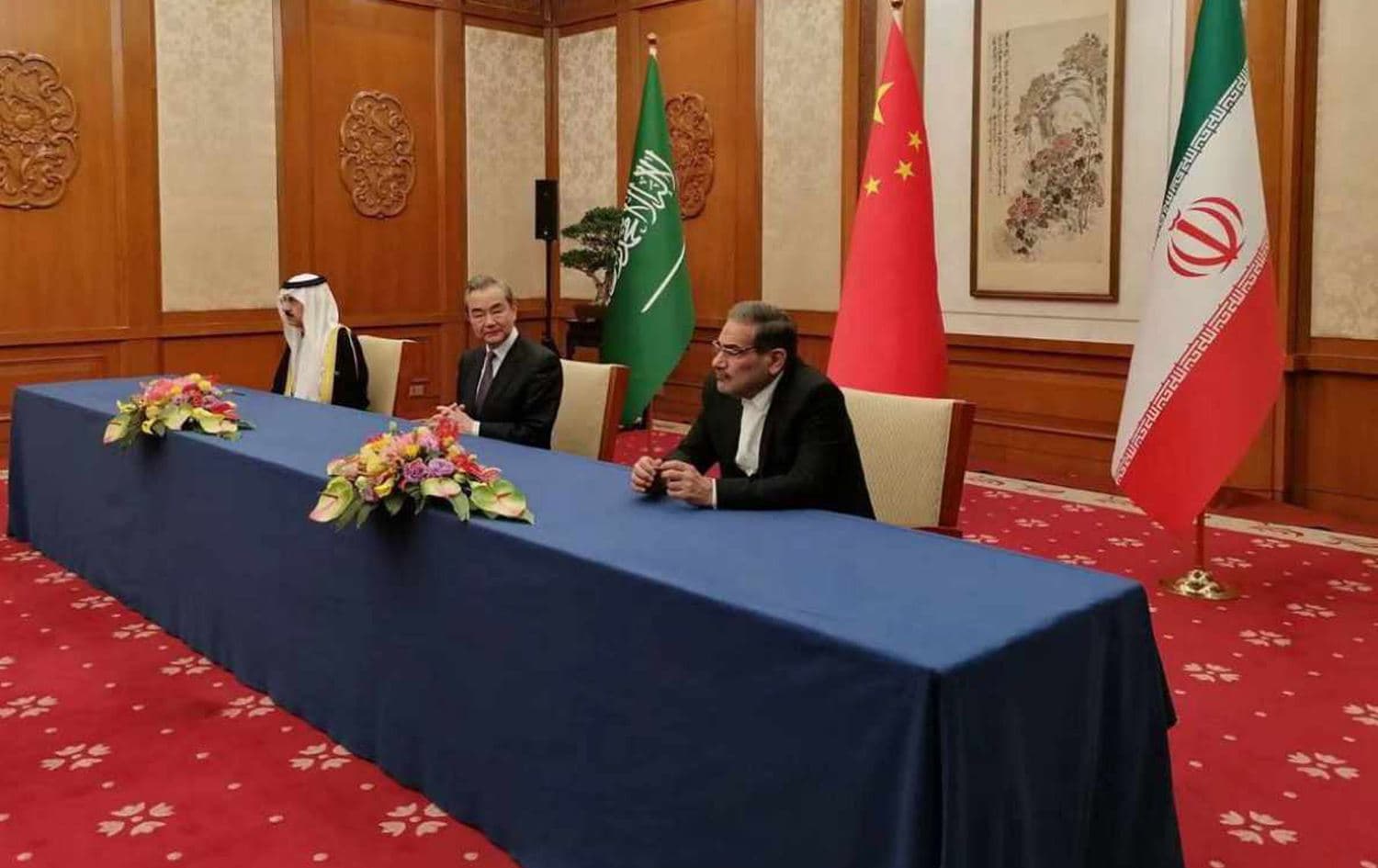 Iran’s secretary of the Supreme National Security Council Ali Shamkhani and Saudi’s National Security Adviser Musaad bin Mohammed al-Aiban signing an agreement to resume relations in Beijing, China on March 10, 2023. Photo: IRGC affiliated channel/Telegram