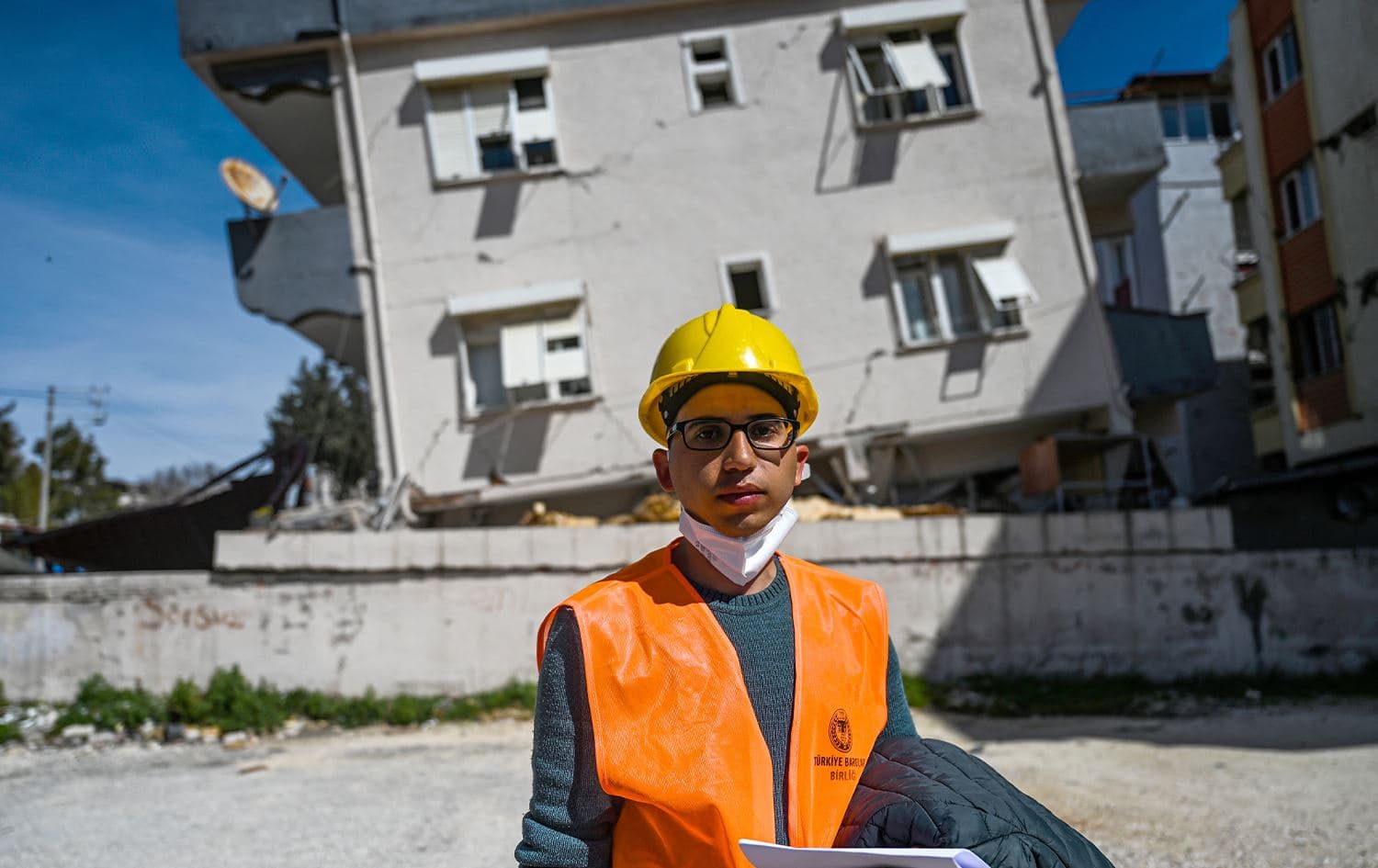 Ahmet Kandemir, a lawyer from Antakya Bar poses as he collects evidence frrom collapsed and damaged buildings in Hatay on March 7, 2023, one month after a massive earthquake struck southeastern Turkey. Photo: Ozan Kose/AFP